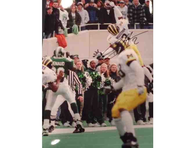 Charles Woodson autographed photograph of 'The Interception' against MSU