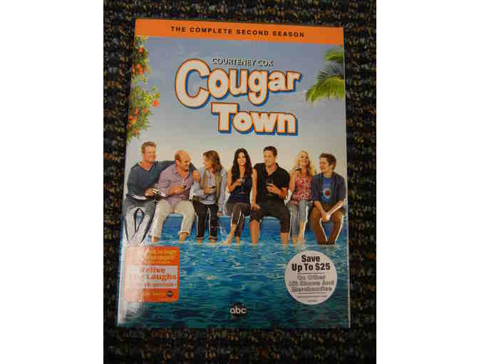 Cougartown TV show package. DVD's of Season 1 & 2 PLUS cast autographed script.