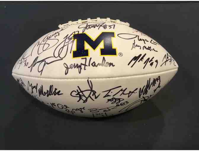 Brian Griese, Charles Woodson, Jake Long, Lloyd Carr. 23 Michigan greats signed M football