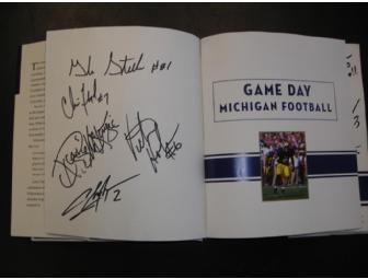 Michigan Gameday Book signed by Woodson, Henne, A-Train and 19 more