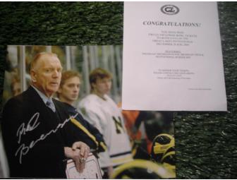Premium Tickets to the Great Lakes Invitational and an autographed picture of Coach Red Berenson