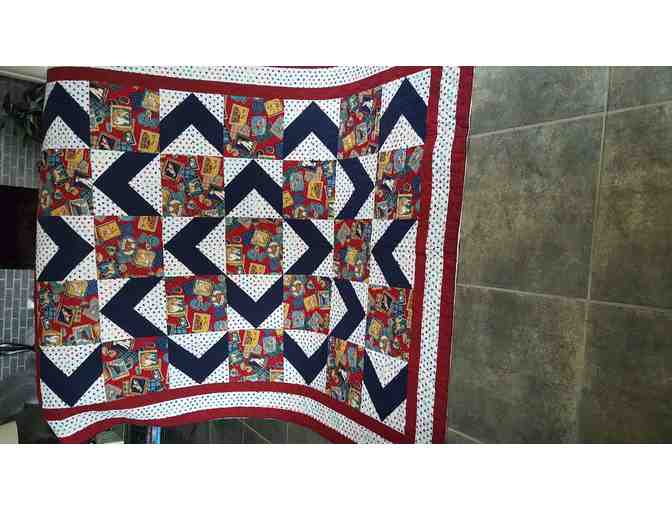 A full sized, 67' x 85' Dog Themed Quilt!