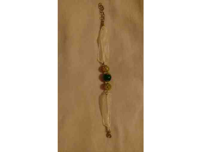 Bracelet with Gold and Green Beads on Yellow Ribbon