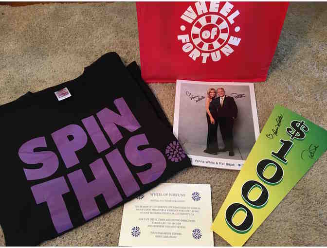 Four VIP Passes to a taping of  Wheel of Fortune