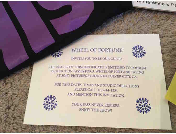 Four VIP Passes to a taping of  Wheel of Fortune