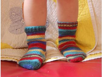 Hand knit socks just for you by the KUNM auction coordinator