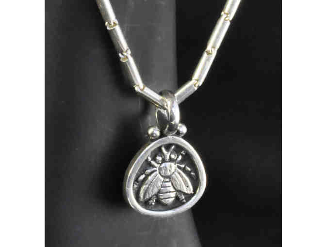 Honeybee pendant on a Silver Thai baht chain from the Golden Eye in Santa Fe