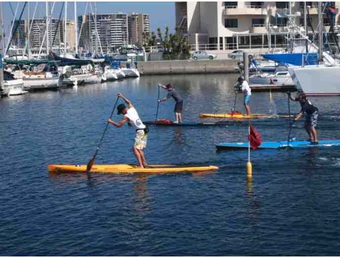 Learn to stand up paddle board for two with a pro
