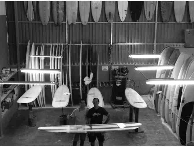 $100 Credit towards a 5-Point Red Star Surf Board and Logo T-Shirt by Cheboards