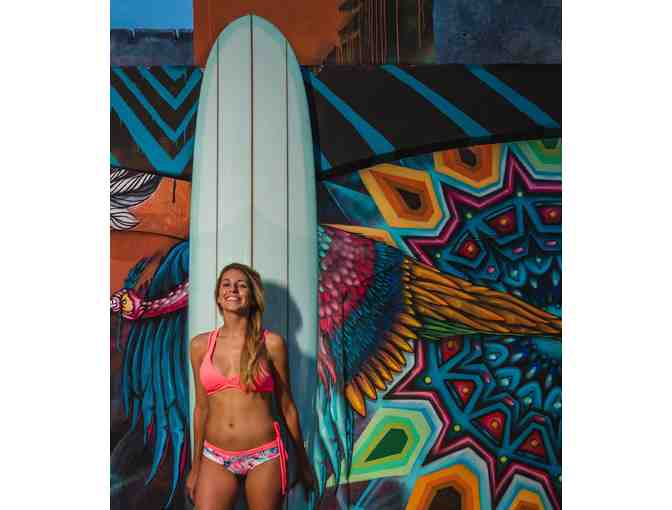 $100 Credit towards a 5-Point Red Star Surf Board and Logo T-Shirt by Cheboards