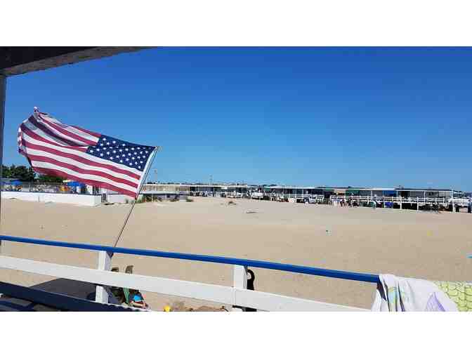 A Summer Friday at the Beach - admission for 8 to a Breezy Point Surf Club Cabana