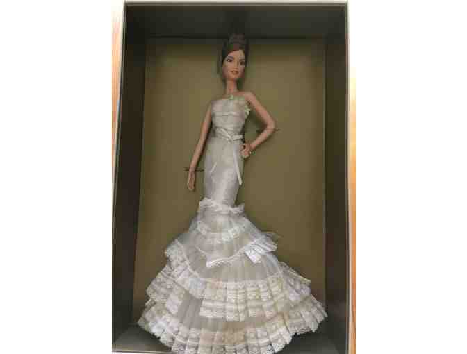 005. Barbie Collectible. Vera Wang designs Barbie's wedding gown.