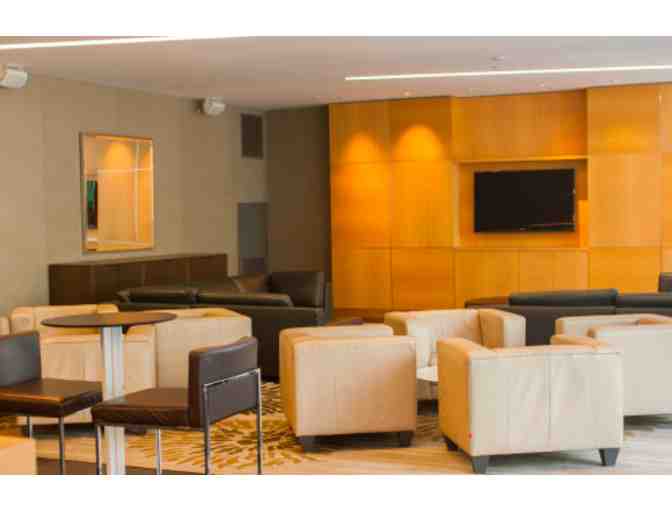 The Infinity Club Lounge: Hosted party in a high-end building.*