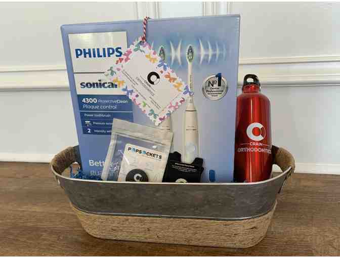 Swag Basket from Dr. Crain Orthodontics, Includes Sonicare Toothbrushes (2)