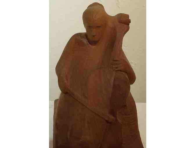 Cello Player (wood carving, 12'H x 7'D x 8'W), Paul Reiber