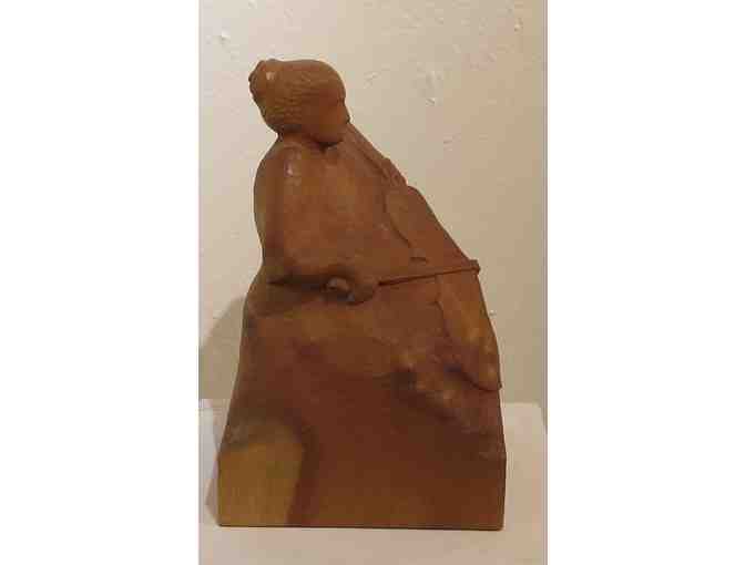 Cello Player (wood carving, 12'H x 7'D x 8'W), Paul Reiber