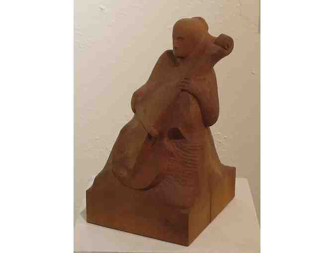 Cello Player (wood carving, 12'H x 7'D x 8'W), Paul Reiber