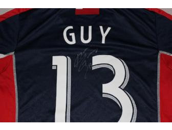 Ryan Guy #13 navy jersey w/ leukemia awareness ribbon