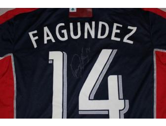 Diego Fagundez #14 navy jersey w/ leukemia awareness ribbon