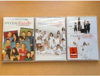 'Modern Family' DVDs, signed cast photo and T-shirts