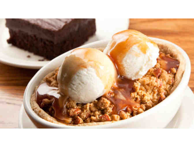 Cook up a storm! Dinner with wine pairings prepared by Helping Hands' Executive Director