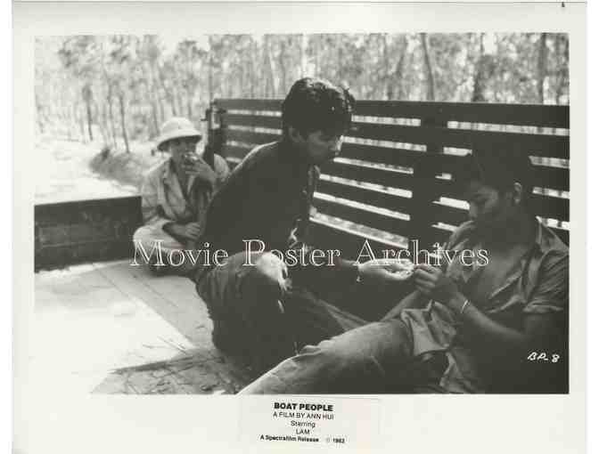 BOAT PEOPLE, 1983, movie still set, dealers lot, George Lam, Cora Miao