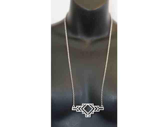 Lucky Brand long silver necklace with southwest-inspired pendant