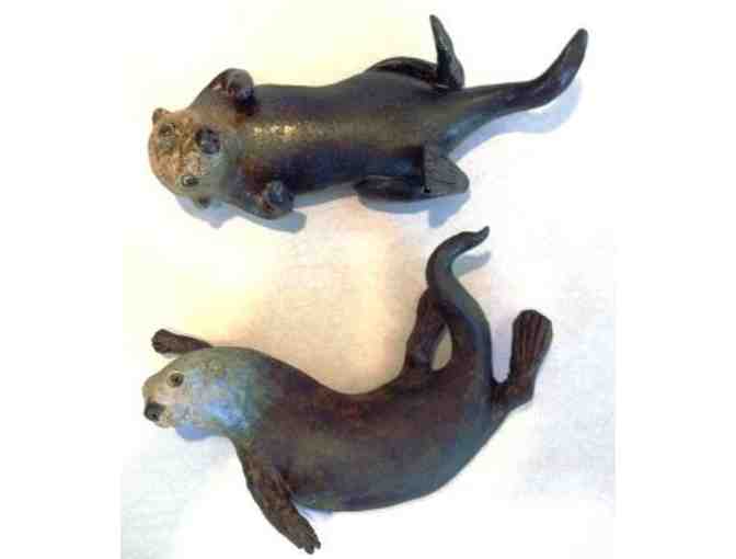 Pair of Ceramic Otters