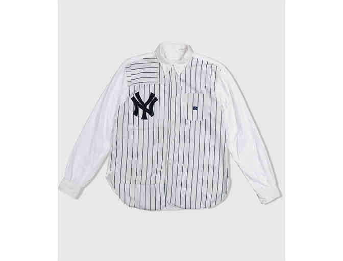 One of one shirt made from repurposed materials