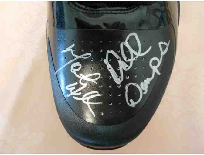 New Orleans Pelicans shoe with autograph of Head Coach Monty Williams and GM Dell Demps