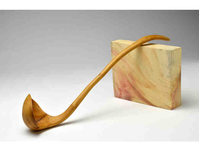 Dan Dustin's long spoon with a signed copy of his book, 'Spoon Tales'