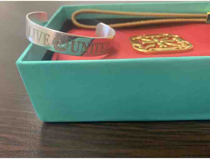 Custom 'Live United' metal cuff and wristlet from Rustic Cuff