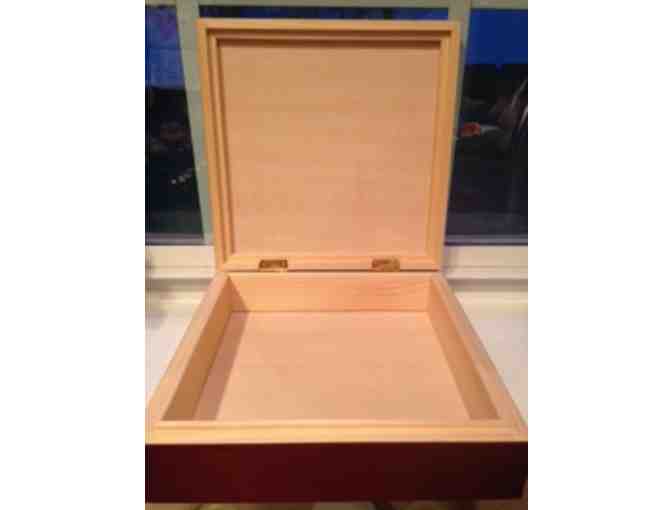 A hand crafted wooden box with beautiful ceramic tile detail