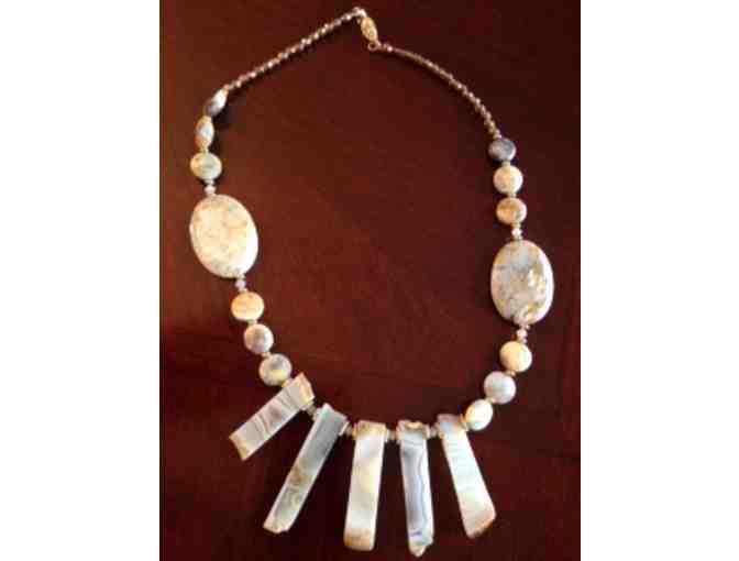 A hand-made necklace and earrings set from Diana Lennon Designs