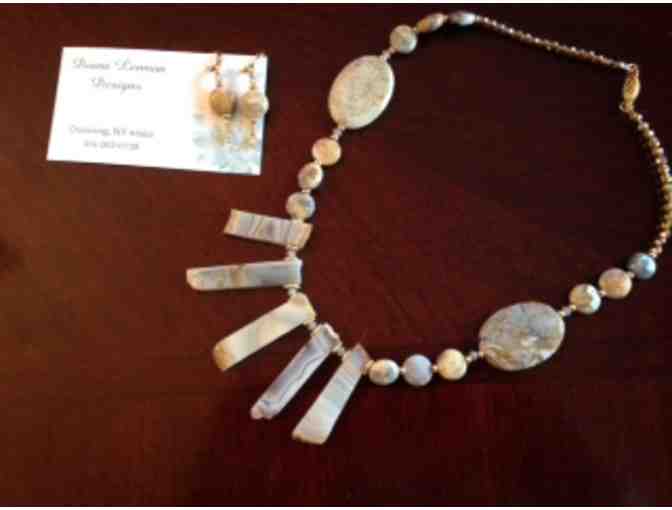 A hand-made necklace and earrings set from Diana Lennon Designs