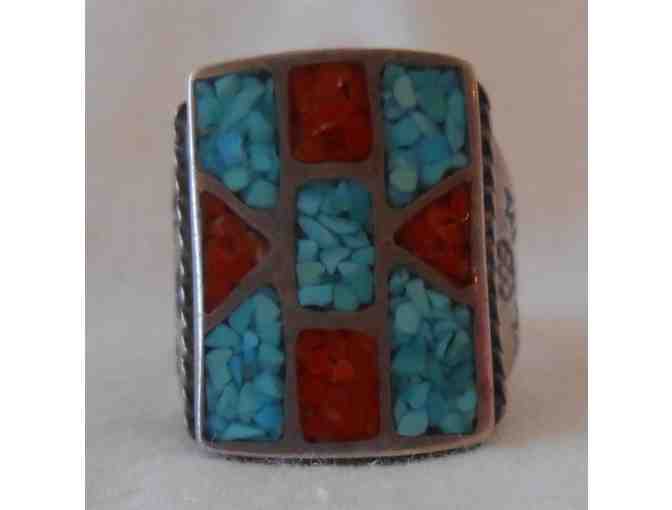 Ring of sterling silver inlaid with turquoise and coral chips