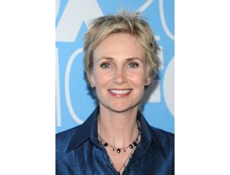 Signed Jane Lynch Jump Suit and helmet