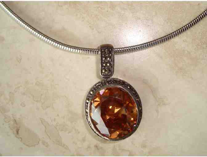 Necklace With Oval Orange Gem Pendant in Sterling Silver Marcasite Setting