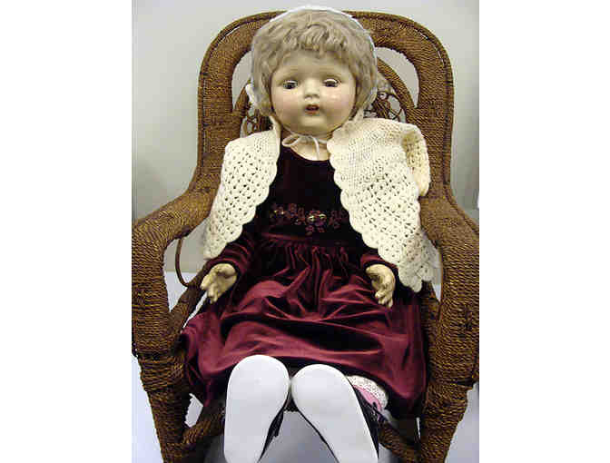 Vintage Life Size Porcelain Doll in Child Size Wicker Rocker