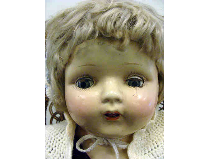 Vintage Life Size Porcelain Doll in Child Size Wicker Rocker