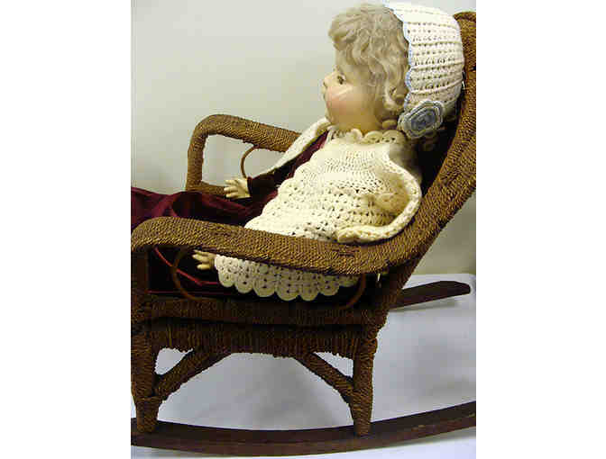 Vintage Life Size Porcelain Doll in Child Size Wicker Rocker
