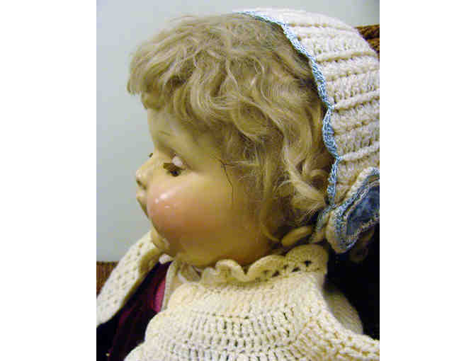 Vintage Life Size Porcelain Doll in Child Size Wicker Rocker