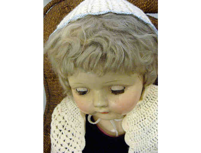 Vintage Life Size Porcelain Doll in Child Size Wicker Rocker