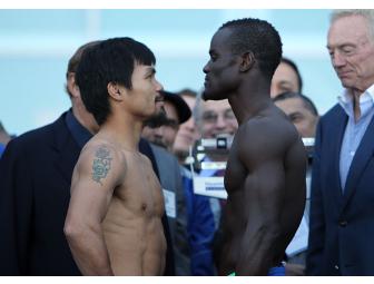 Autographed boxing glove by Manny Pacquiao and Joshua Clottey