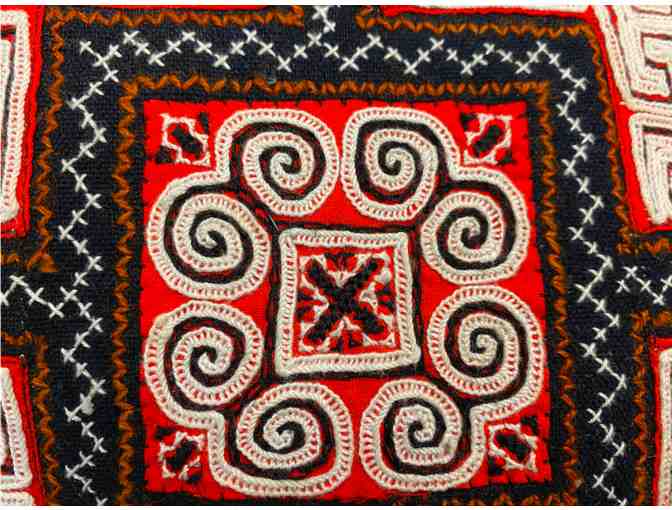 Two Black, Red, and White Pillows