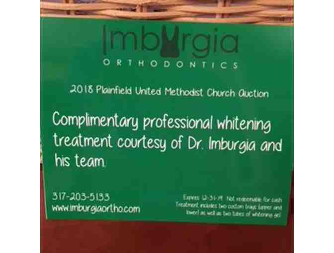 Teeth whitening certificate and spinning toothbrush - Imburgia Orthodontics