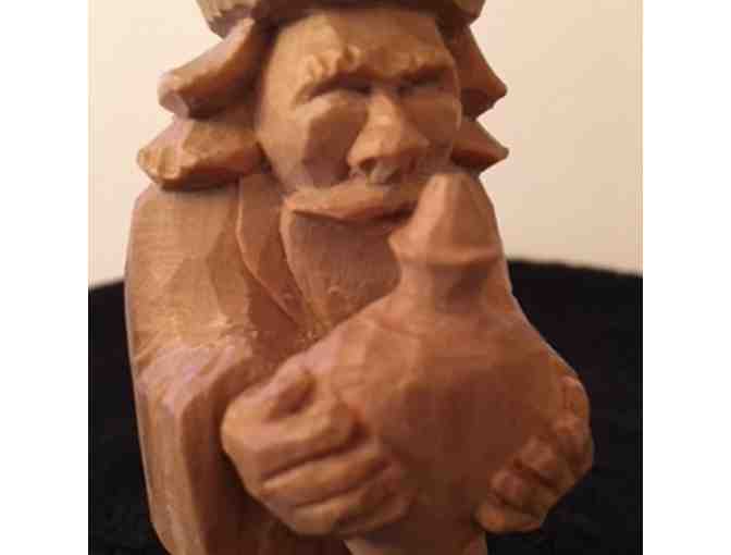 Woodcarving of Magi with Vase