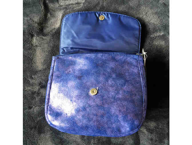 Metallic Purple Clutch filled with Beauty Samples