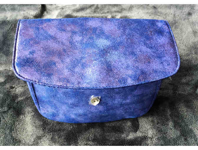 Metallic Purple Clutch filled with Beauty Samples