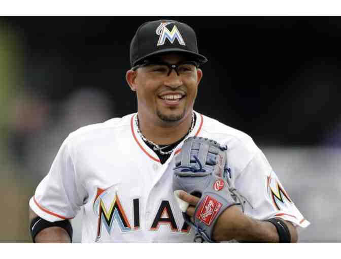 Marlins 4 homeplate box seats and a signed baseball